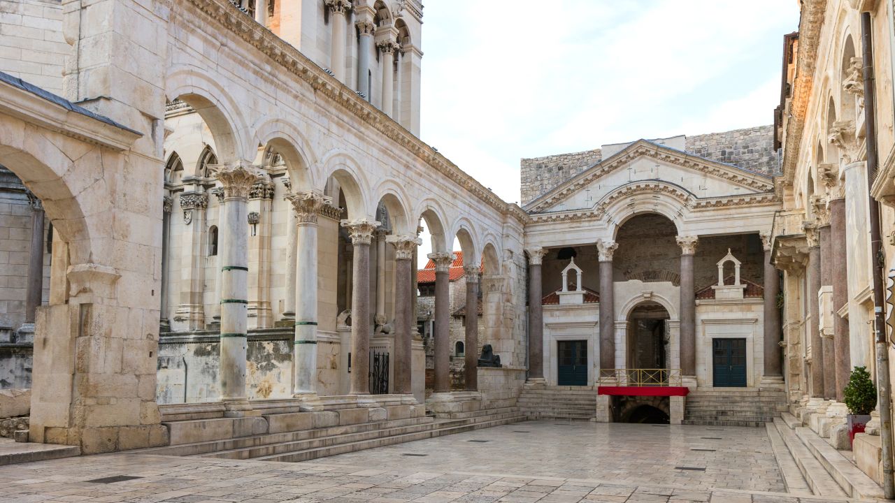 Diocletian was born in nearby Salona (now Solin in Croatia) around 244 AD and rose to become emperor of Rome around 285 AD. Peristyle, the center of his ancient palace, is shown here.
