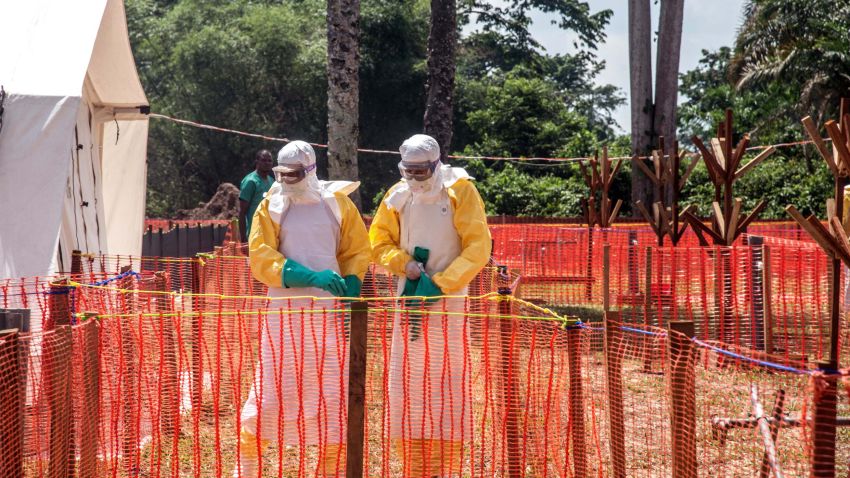 Health workers operate within an Ebola safety zone in the Health Center in Iyonda, near Mbandaka, on June 1, 2018. - The UN health agency and DRC authorities are rushing to contain the outbreak that has sickened 54 people in recent weeks, including 25 who have died. (Photo by Junior D. KANNAH / AFP)        (Photo credit should read JUNIOR D. KANNAH/AFP/Getty Images)