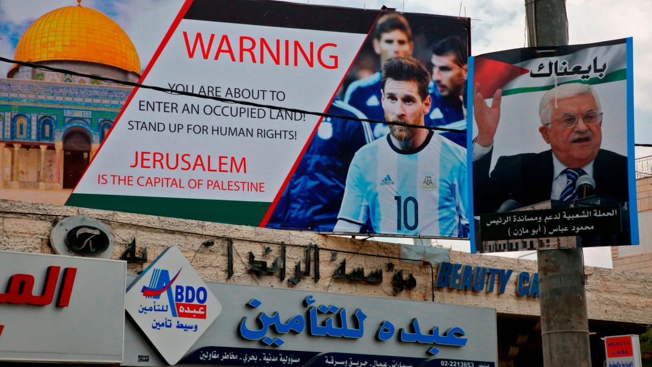 A picture taken on Tuesday shows a poster erected on a main street in Hebron denouncing the fixture between Argentina and Israel. 