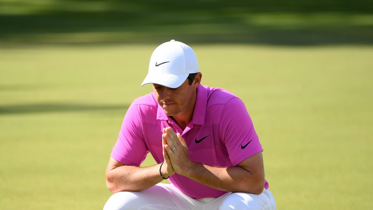 VIRGINIA WATER, ENGLAND - MAY 27:  Rory McIlroy of Northern Ireland reacts to a missed eagle putt on the 18th green during the final round of the BMW PGA Championship at Wentworth on May 27, 2018 in Virginia Water, England.  (Photo by Ross Kinnaird/Getty Images)
