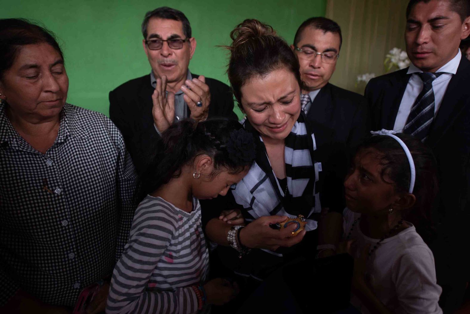 Mariela de los Angeles Carrillo de Galindo receives a post-mortem recognition after her husband, Juan Fernando Galindo, was killed after the volcano erupted. He was a local representative of the National Coordinator for Disaster Reduction.