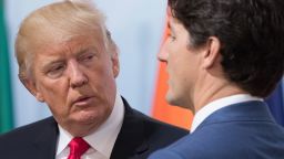 HAMBURG, GERMANY - JULY 08: U.S. President Donald Trump (L) and Canada's Prime Minister Justin Trudeau talk ahead of panel discussion titled 'Launch Event Women's Entrepreneur Finance Initiative' on the second day of the G20 summit on July 8, 2017 in Hamburg, Germany. Leaders of the G20 group of nations are meeting for the July 7-8 summit. Topics high on the agenda for the summit include climate policy and development programs for African economies.  (Photo by Matt Cardy/Getty Images)