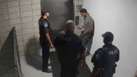 Robert Johnson, 33, with Mesa Police in surveillance footage from May 23, 2018.
