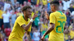 LIVERPOOL, ENGLAND - JUNE 03:  Firmino of Brazil celebrates after scoring his sides second goal with Neymar Jr of Brazil during the International Friendly match between Croatia and Brazil at Anfield on June 3, 2018 in Liverpool, England.  (Photo by Alex Livesey/Getty Images)