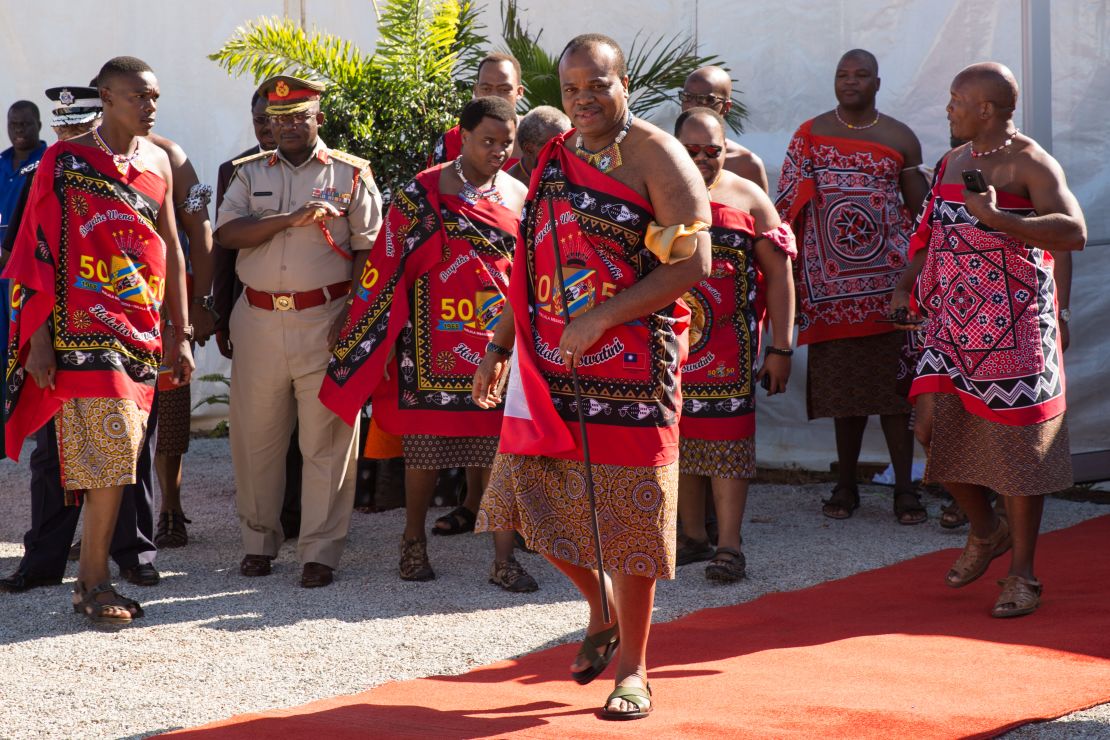 King Mswati III arrives at the opening of a Ministry of Health facility.