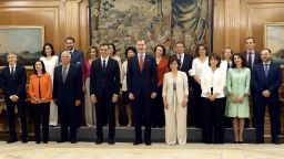 The new spanish government's ministers pose with Spanish Prime Minister Pedro Sanchez (7L) and king Felipe VI (C) after taking oath of office at La Zarzuela palace in Madrid on June 7, 2018. 