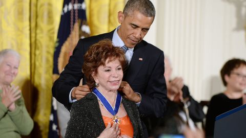 President Barack Obama presents the Medal of Freedom to Isabel Allende in 2014.