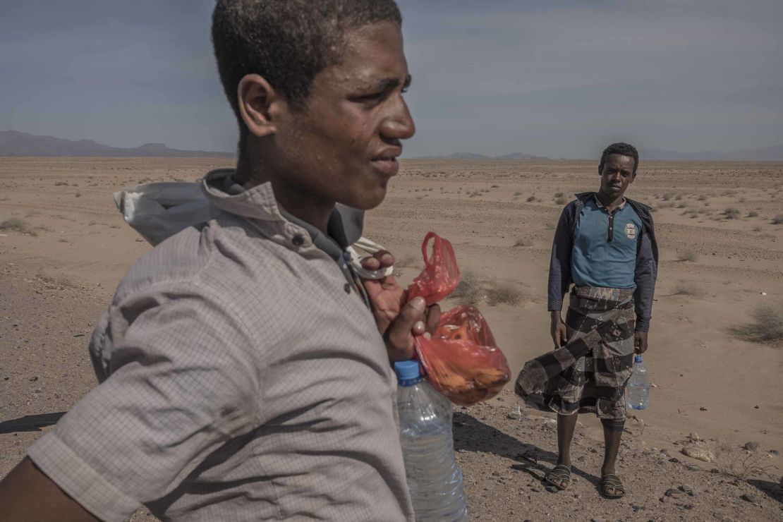 Ethiopian migrants on the road along the western coast of Yemen, walking toward Saudi Arabia.