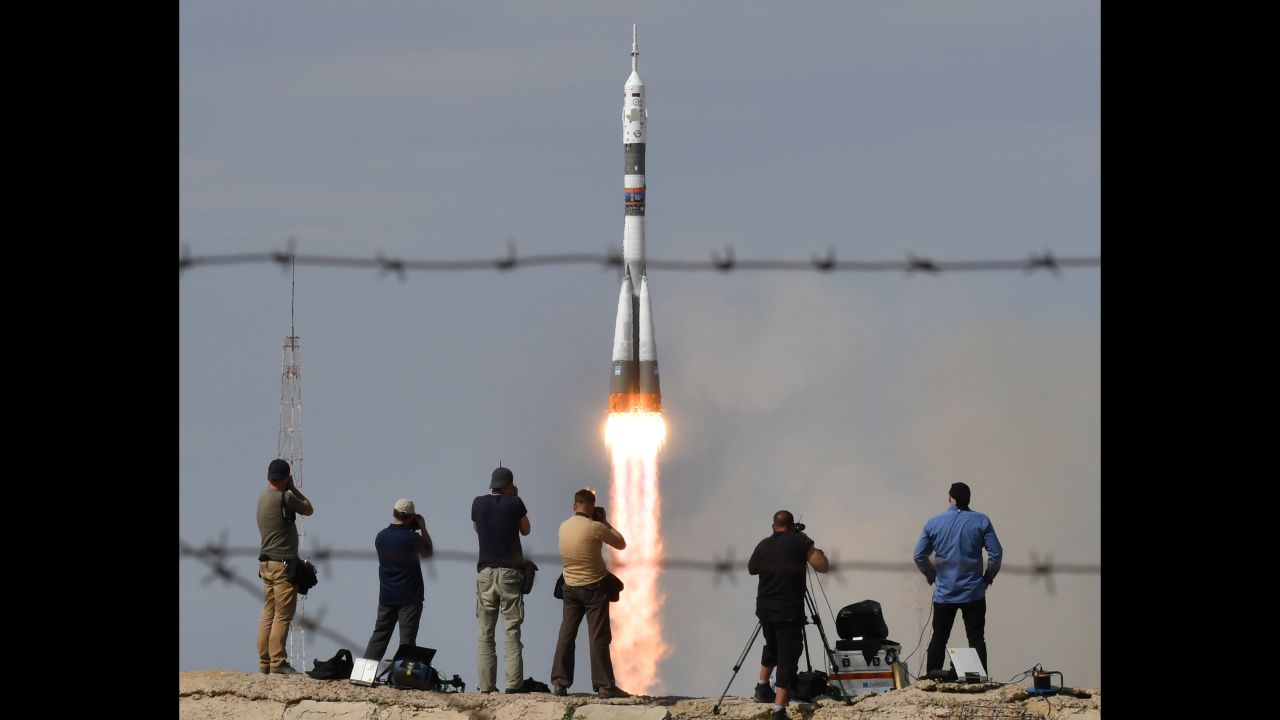 Photographers focus on the Soyuz MS-09 spacecraft as it blasts off from the Baikonur Cosmodrome in Kazakhstan on Wednesday, June 6. The spacecraft was carrying three astronauts to the International Space Station.