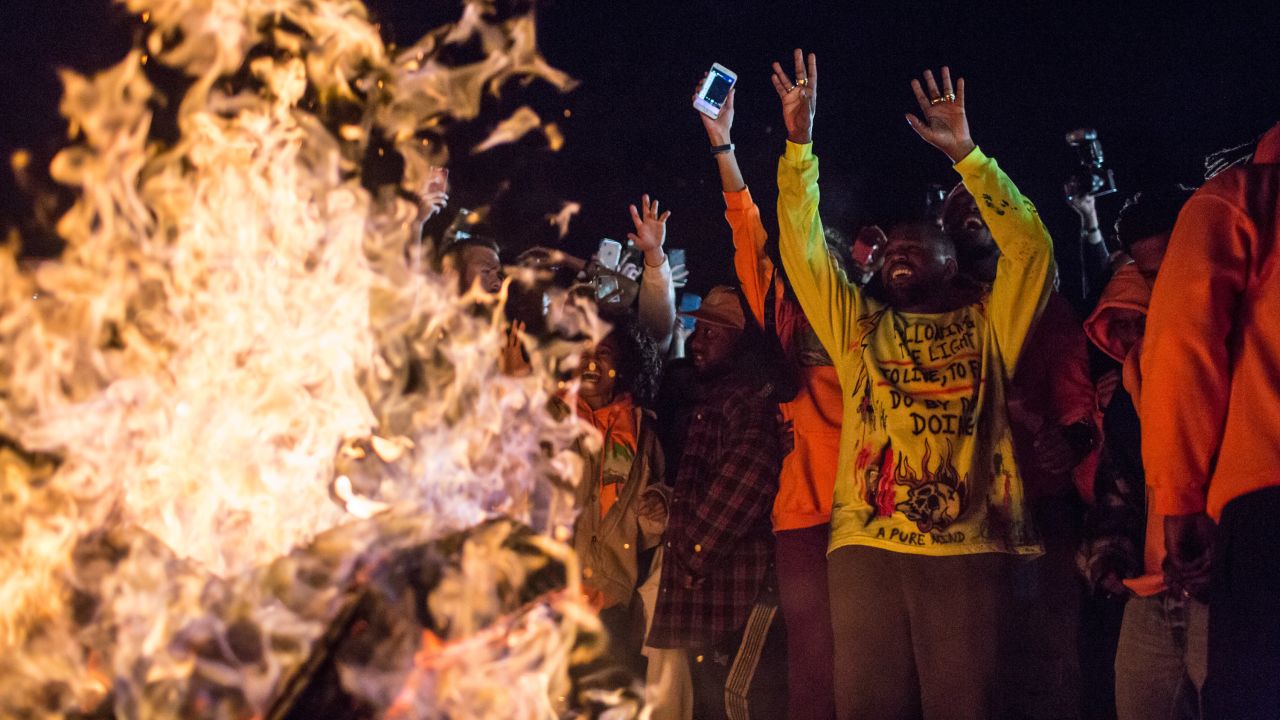 Rapper Kanye West dances around a bonfire at <a href="https://www.cnn.com/2018/06/01/entertainment/kanye-west-new-album/index.html" target="_blank">his album-listening party</a> in Moran, Wyoming, on Thursday, May 31. "Ye" is his eighth album.