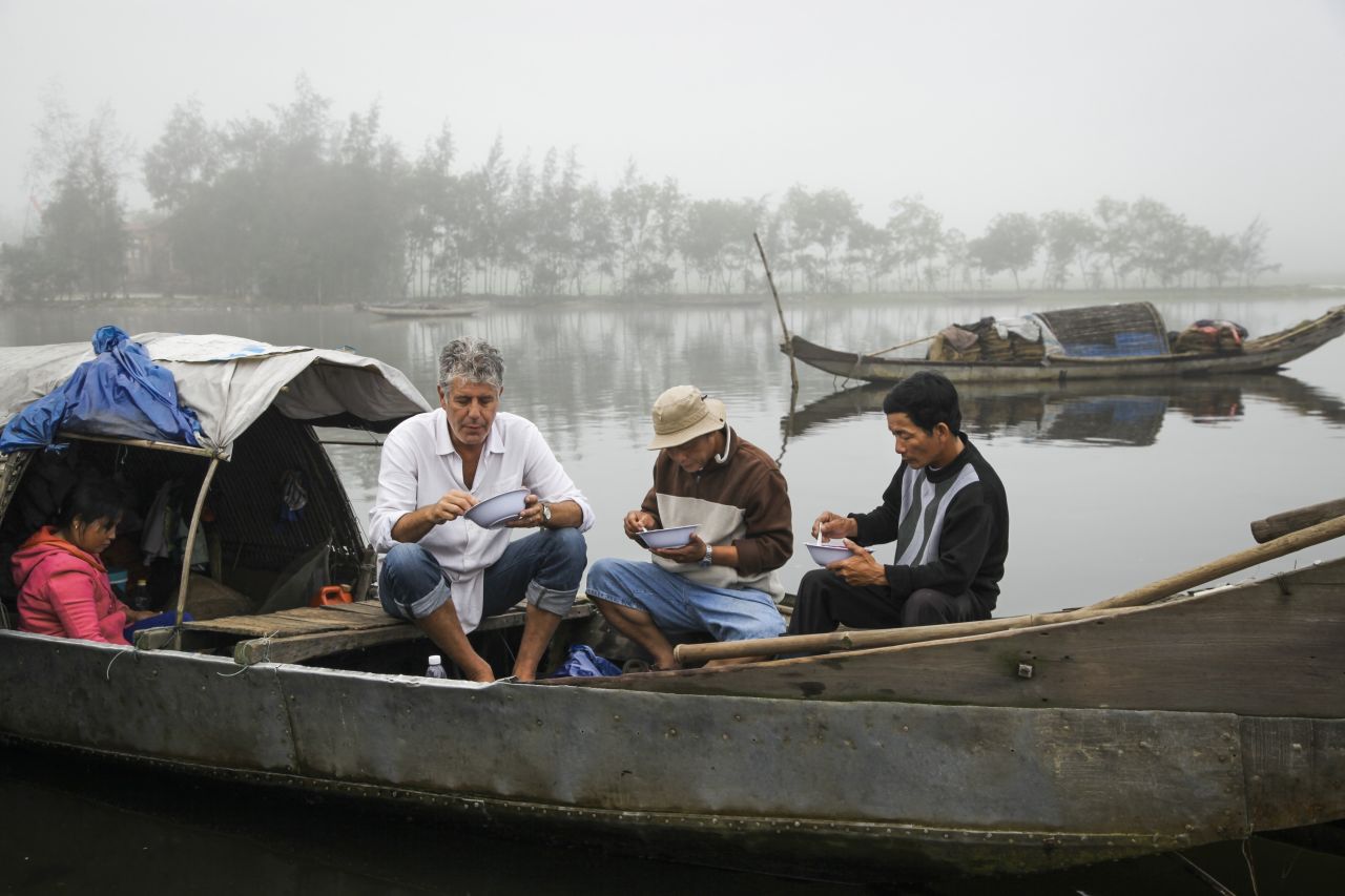 Bourdain enjoys a bite of food while on location in Vietnam. While accepting a Peabody Award for "Parts Unknown" in 2013, Bourdain said: "We ask very simple questions: What makes you happy? What do you eat? What do you like to cook? And everywhere in the world we go and ask these very simple questions. We tend to get some really astonishing answers."