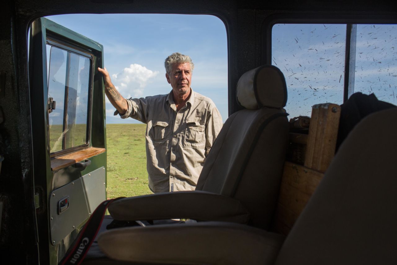 Bourdain visits the Serengeti plain in Tanzania in 2014.
