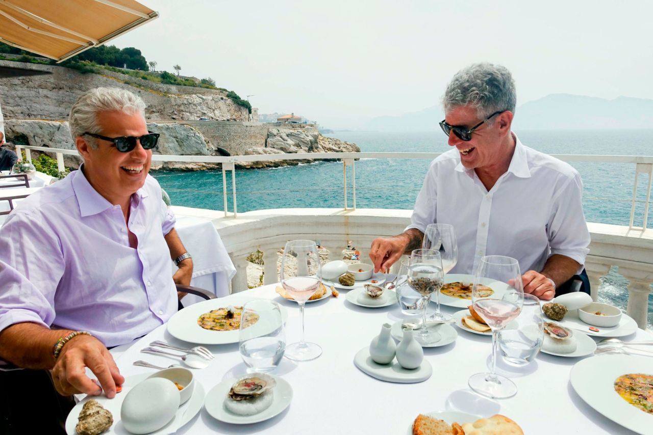Bourdain and chef Eric Ripert have lunch in Marseille, France, in 2015. Ripert was the person who found Bourdain unresponsive in his hotel room in 2018.