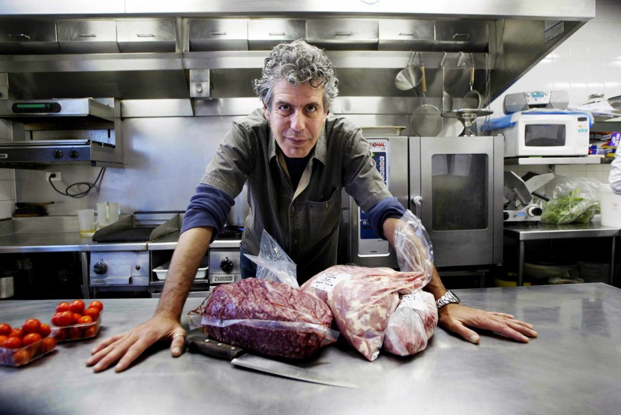 Bourdain poses in a Sydney kitchen in 2005. He got his first TV show in 2002 when he hosted "A Cook's Tour" on the Food Network. 