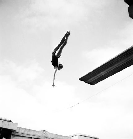 The winner of a 1962 diving competition at a Paris swimming pool.
