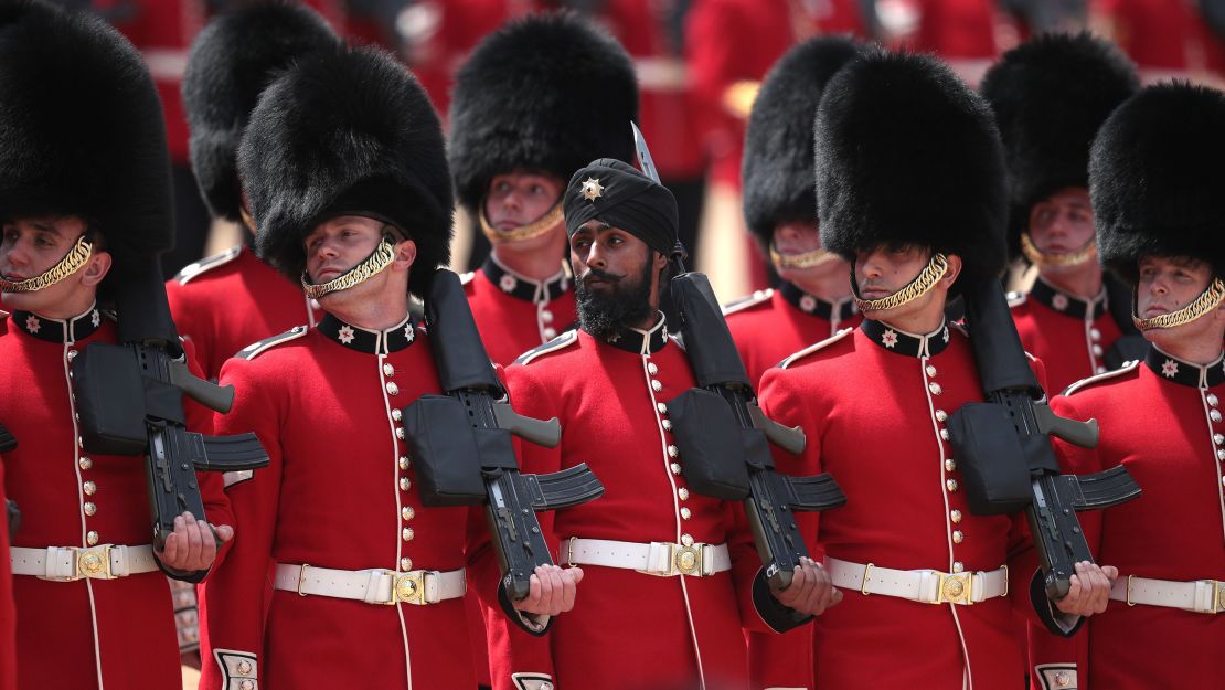 Sikh Guardsman Charanpreet Singh Lall wears a turban in Saturday's Trooping the Colour ceremony.