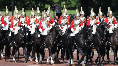 Members of the Queen's personal troops, the Household Division, march on the Mall on Saturday.