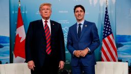 U.S. President Donald Trump meets with Canadian Prime Minister Justin Trudeau at the G-7 summit, Friday, June 8, 2018, in Charlevoix, Canada. (AP Photo/Evan Vucci)