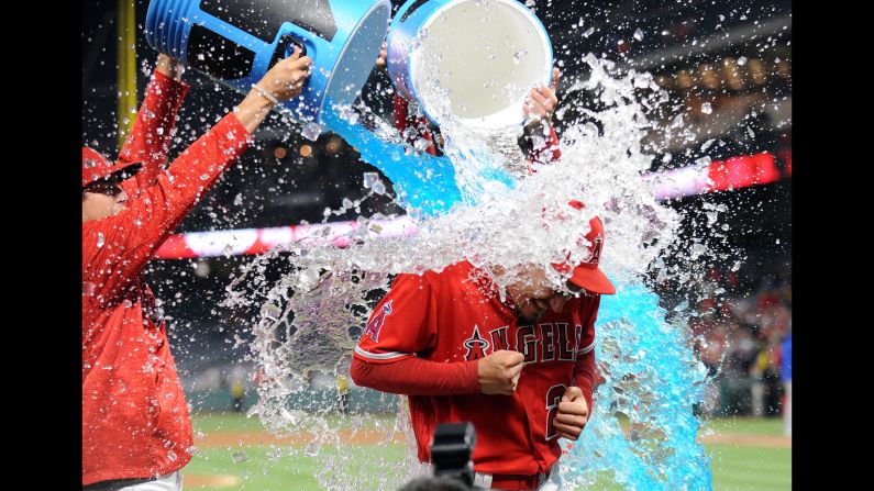 Los Angeles Angels starting pitcher Andrew Heaney is doused with a sports drink following his one hit complete game victory against the Kansas City Royals in Anaheim, California on Tuesday, June 5. 