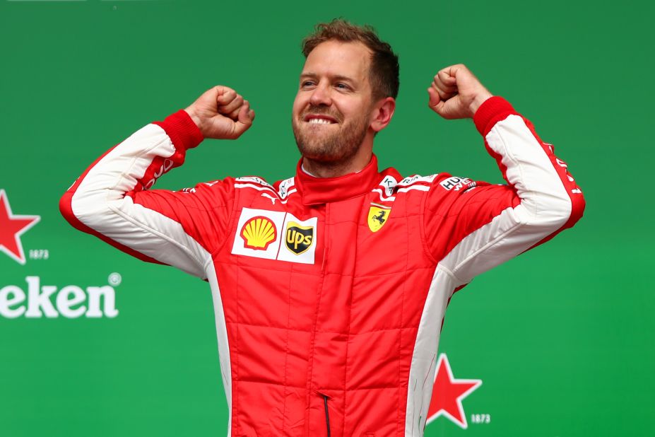 Sebastian Vettel's 50th career victory saw him replace Lewis Hamilton at the top of the championship standings to cap an emotional day for the Ferrari team.  