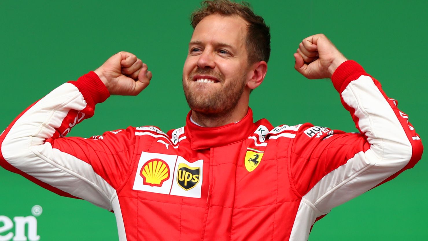 Sebastian Vettel celebrates his victory in the Canadian GP in Montreal to take the title lead.