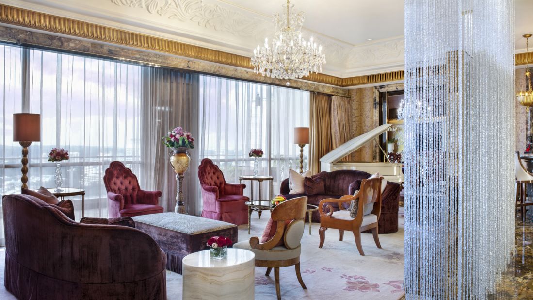 <strong>Living room: </strong>The suite is filled with hand-painted silk panels, a water fountain, baby grand piano and original works by big-name artists including Marc Chagall.<br />