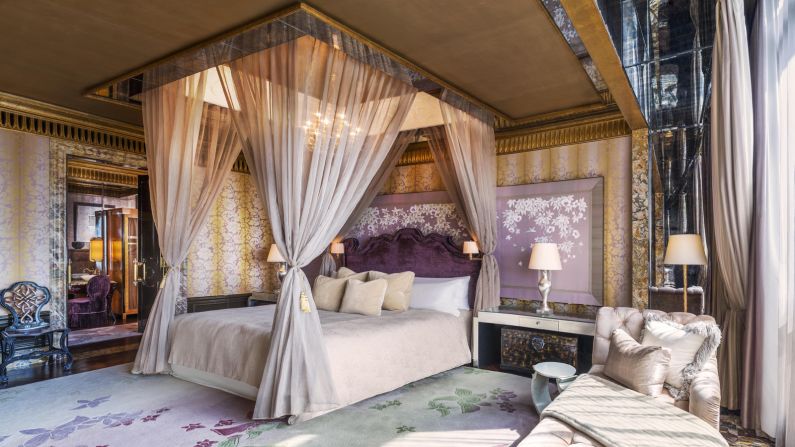 <strong>Master bedroom: </strong>The bedroom features a king-sized bed fitted with deluxe linens adorned with silken throw pillows. Guests can control the room's electronic devices -- such as the AC, lighting and TV -- with a specially designed bedside remote.