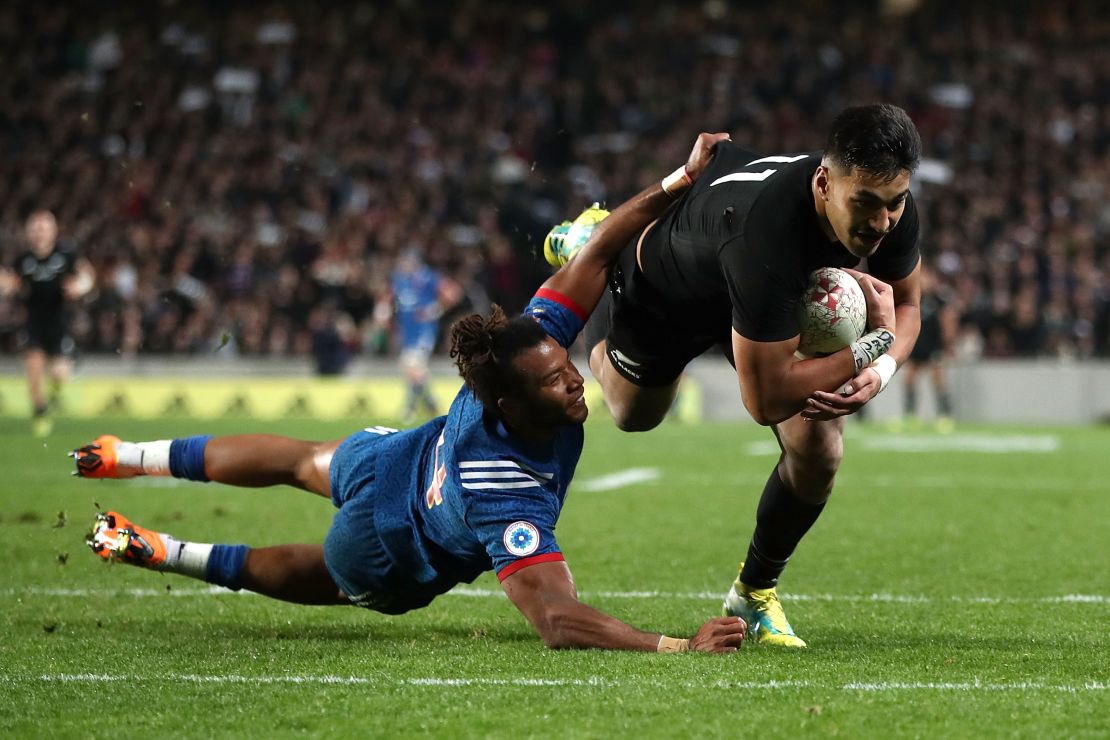 New Zealand's Rieko Ioane scores against France at Eden Park in Auckland.