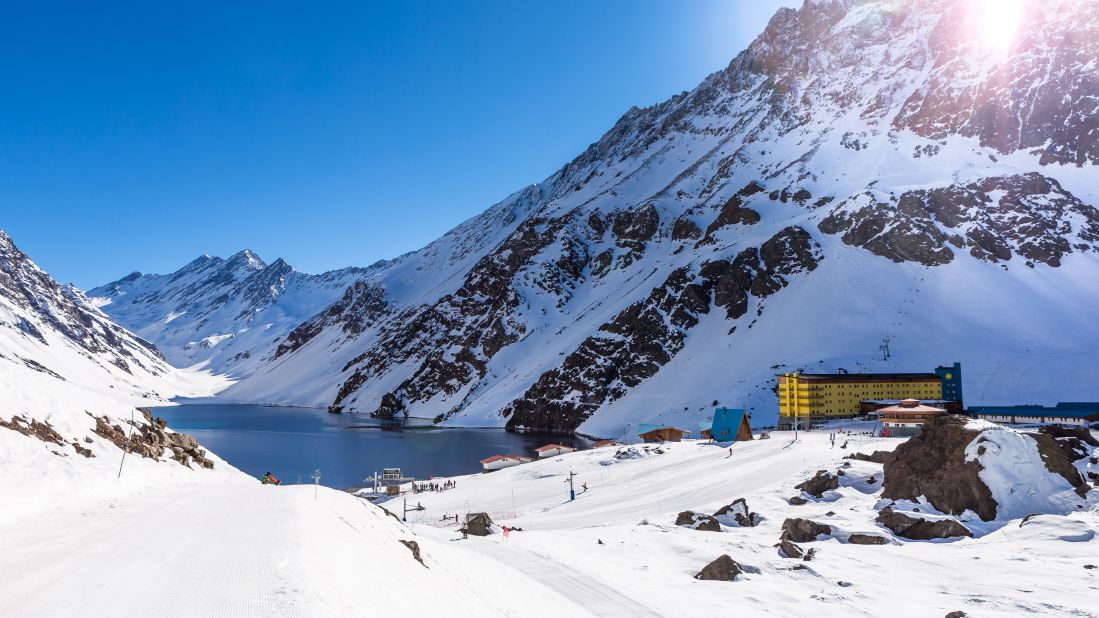 <strong>Chile in July:</strong> Take in the stunning view of the hotel at Ski Portillo, dwarfed by the stunning mountain behind it.