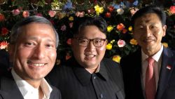 Singapore's Minister for Foreign Affairs Vivian Balakrishnan shared this photo of himself with North Korean leader Kim Jong Un, center, and Ong Ye Kung, Singapore's Minister for Education. The tweet reads, "#Jalanjalan #guesswhwere?"  "Jalan-jalan" means "taking a walk" in Malay.