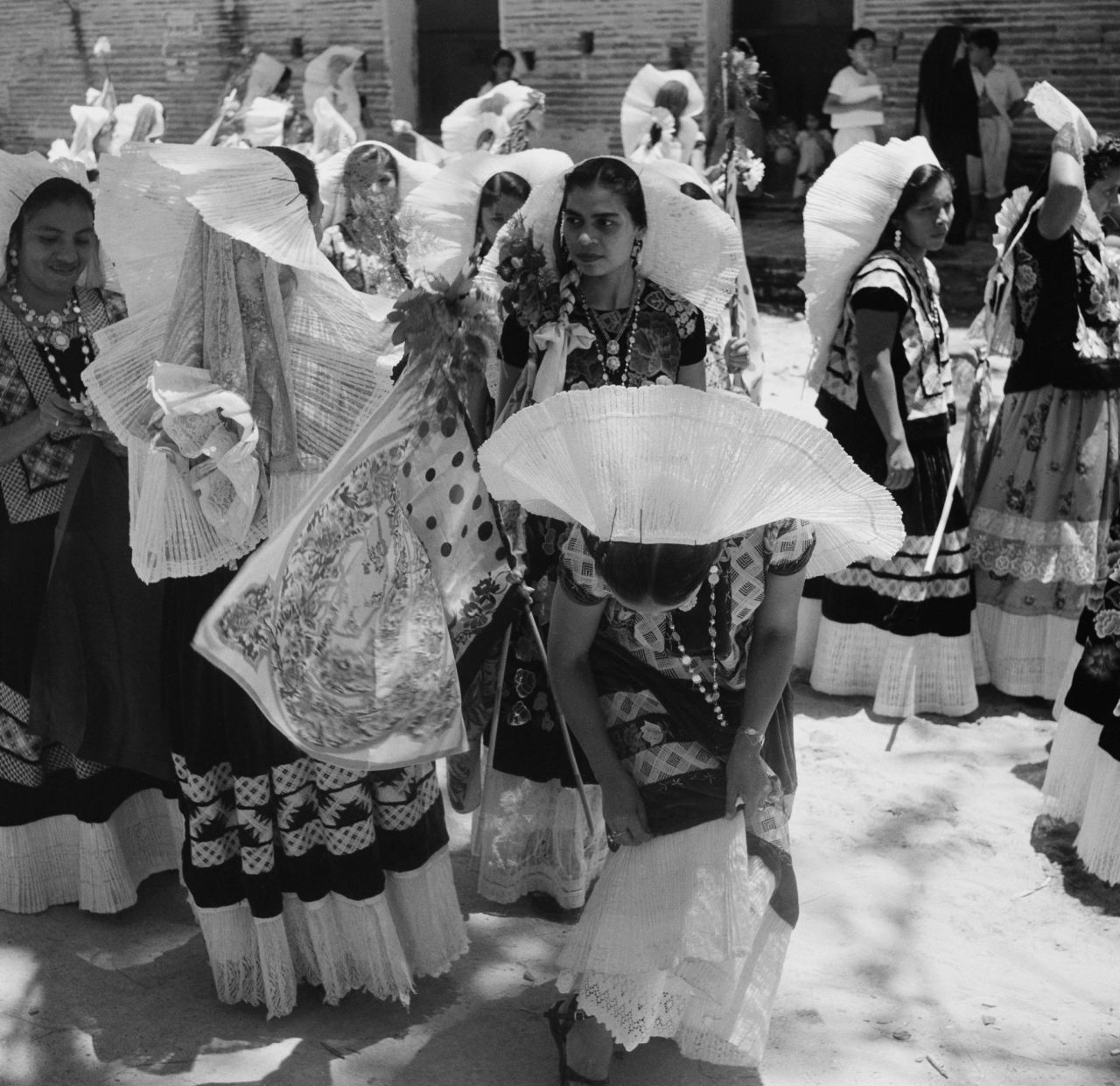Women wearing native dresses in Tehuantepec, Mexico in 1952.
