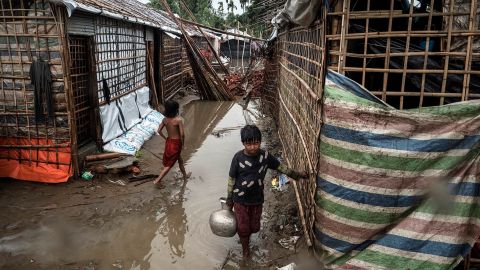 Unicef photos show damage to the homes of Rohingya refugees in a camp near Cox's Bazaar, Bangladesh. 