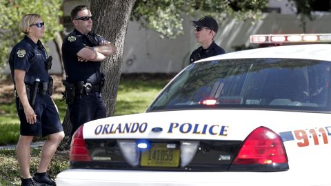 Orlando police block an intersection Monday near an apartment complex where the standoff occurred. 