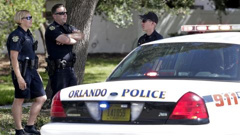 Orlando police block an intersection Monday near an apartment complex where the standoff occurred.