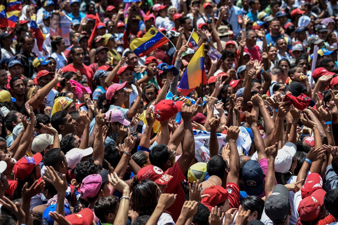 A supporter of Venezuelan President Nicolas Maduro cheers during a campaign rally in Charallave, about 65 km from Caracas, on May 15, 2018.