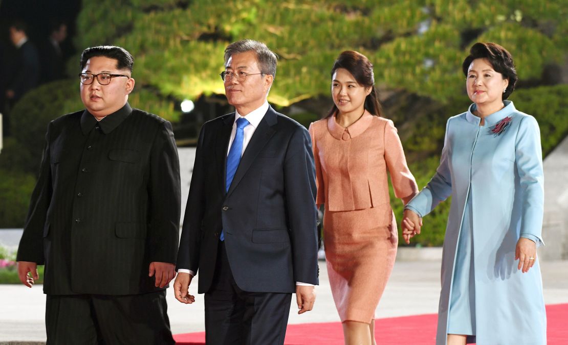 North Korea's leader Kim Jong Un and his wife Ri Sol Ju walk with South Korea's President Moon Jae-in and his wife Kim Jung-sook after their meeting in April.