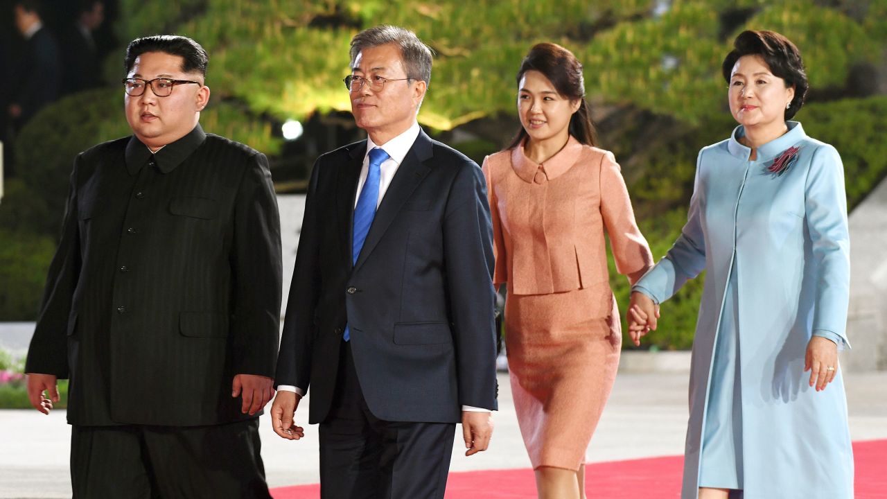 North Korea's leader Kim Jong Un and his wife Ri Sol Ju walk with South Korea's President Moon Jae-in and his wife Kim Jung-sook after their meeting in April.