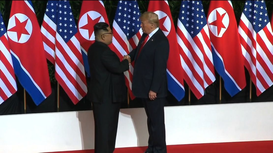 Trump Kim Jong UN shake 2