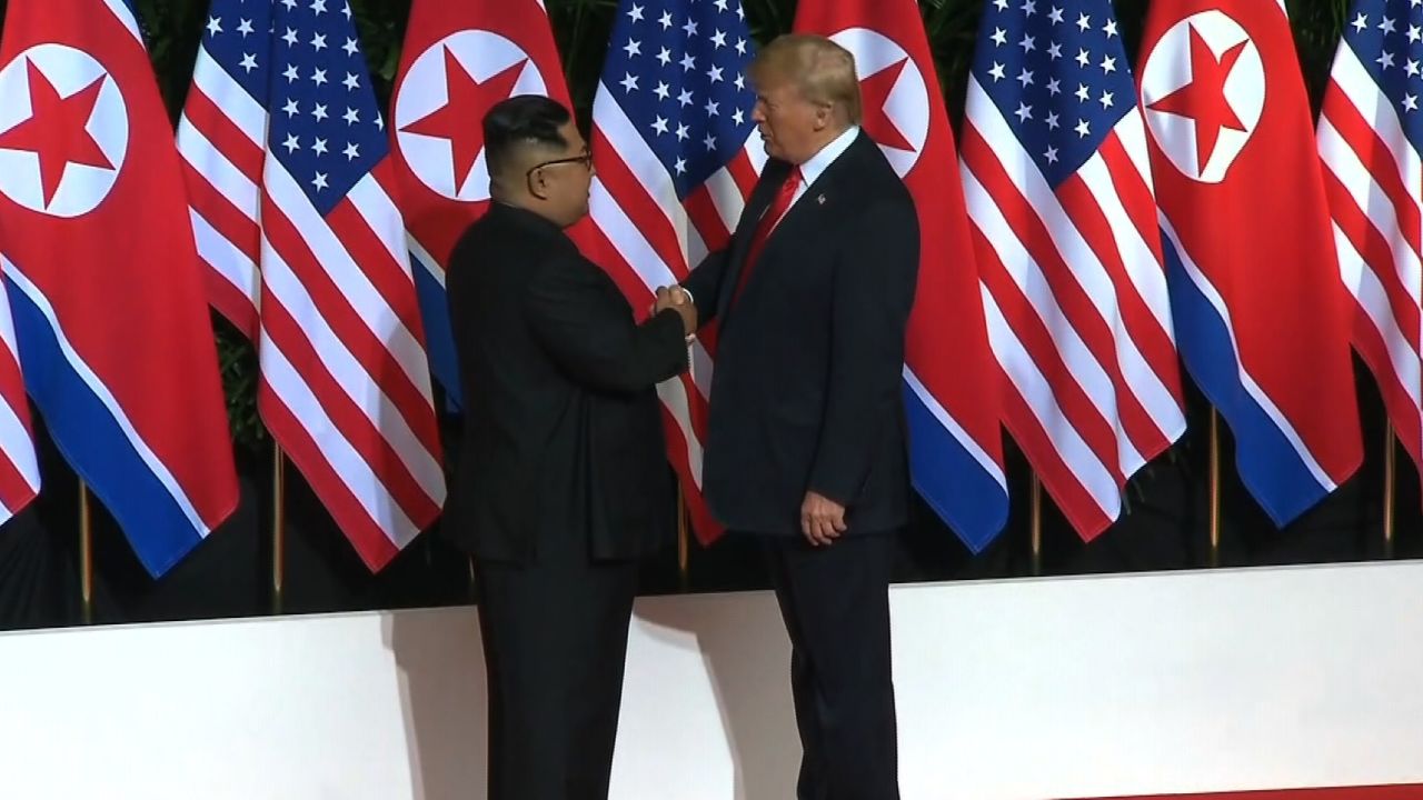 Trump Kim Jong UN shake 2
