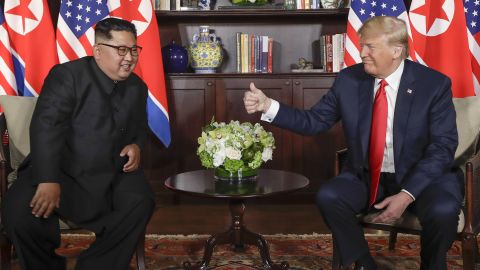 U. S. Donald Trump gives North Korea leader Kim Jong Un a thumbs up at their meeting at the Capella resort on Sentosa Island Tuesday, June 12, 2018 in Singapore. 