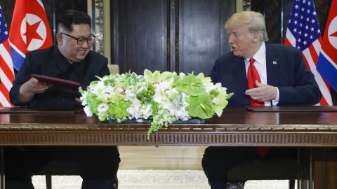 North Korea leader Kim Jong Un and U.S. President Donald Trump exchanged signed documents at the Capella resort on Sentosa Island Tuesday, June 12, 2018 in Singapore.