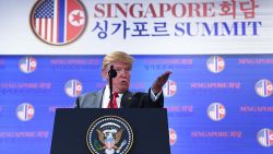 US President Donald Trump speaks at a press conference following the historic US-North Korea summit in Singapore on June 12, 2018. - Trump and North Korean leader Kim Jong Un hailed their historic summit on June 12 as a breakthrough in relations between Cold War foes, but the agreement they produced was short on details about the key issue of Pyongyang's nuclear weapons. (Photo by SAUL LOEB / AFP)        (Photo credit should read SAUL LOEB/AFP/Getty Images)