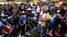 Indian people stage a silent protest demanding to arrest and punish the culprits involved in the killing of two youth in Karbi Anglong district of Assam