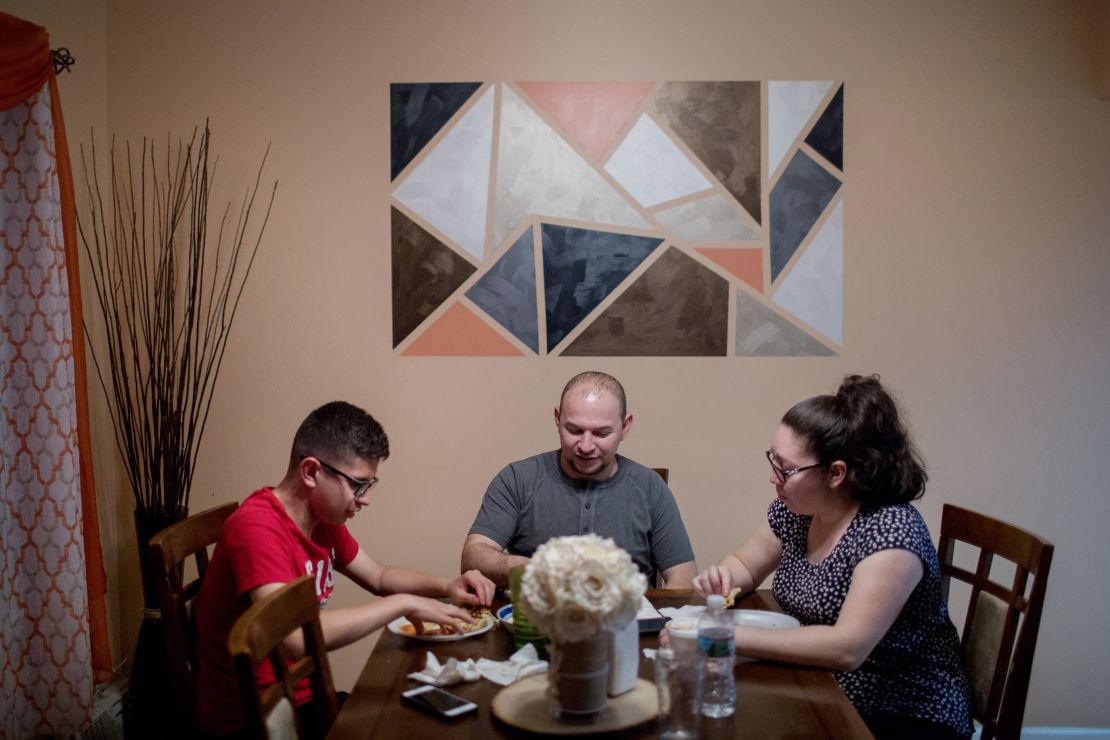 Kevin Portillo has dinner with his mother and father, Sylvia and Luis. 
