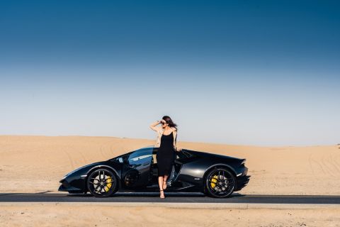 Salpy KI and her Lamborghini Aventador. The club organizes regular drives, and has taken road trips to the Louvre Abu Dhabi and other emirates.