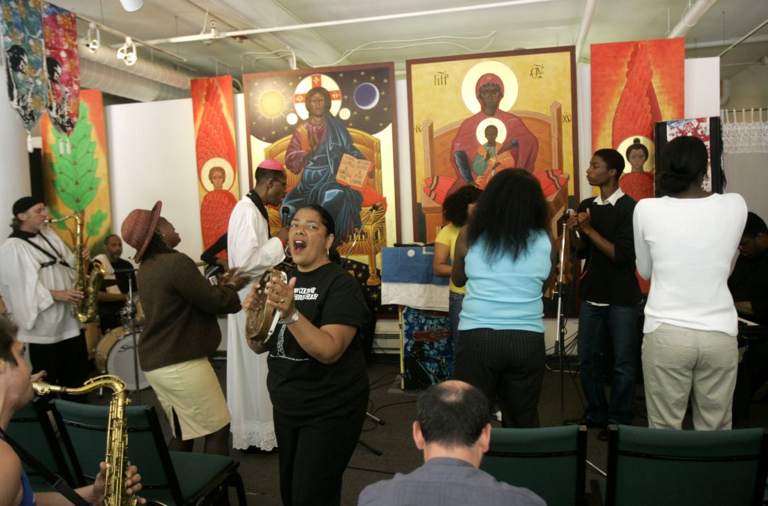 Congregants cheer during a 2008 service at the St. John Will-I-Am Coltrane Church in San Francisco.