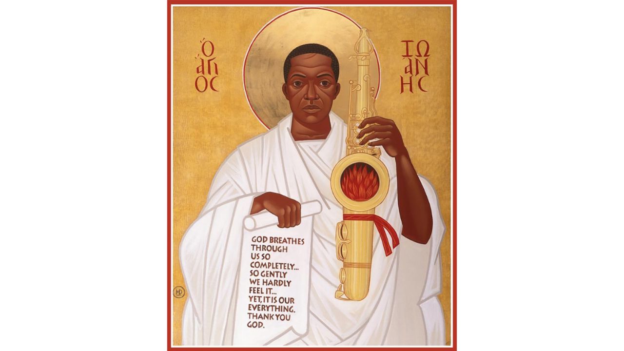 The musician is depicted in artwork holding a saxophone in one hand and a religious scroll in the other.