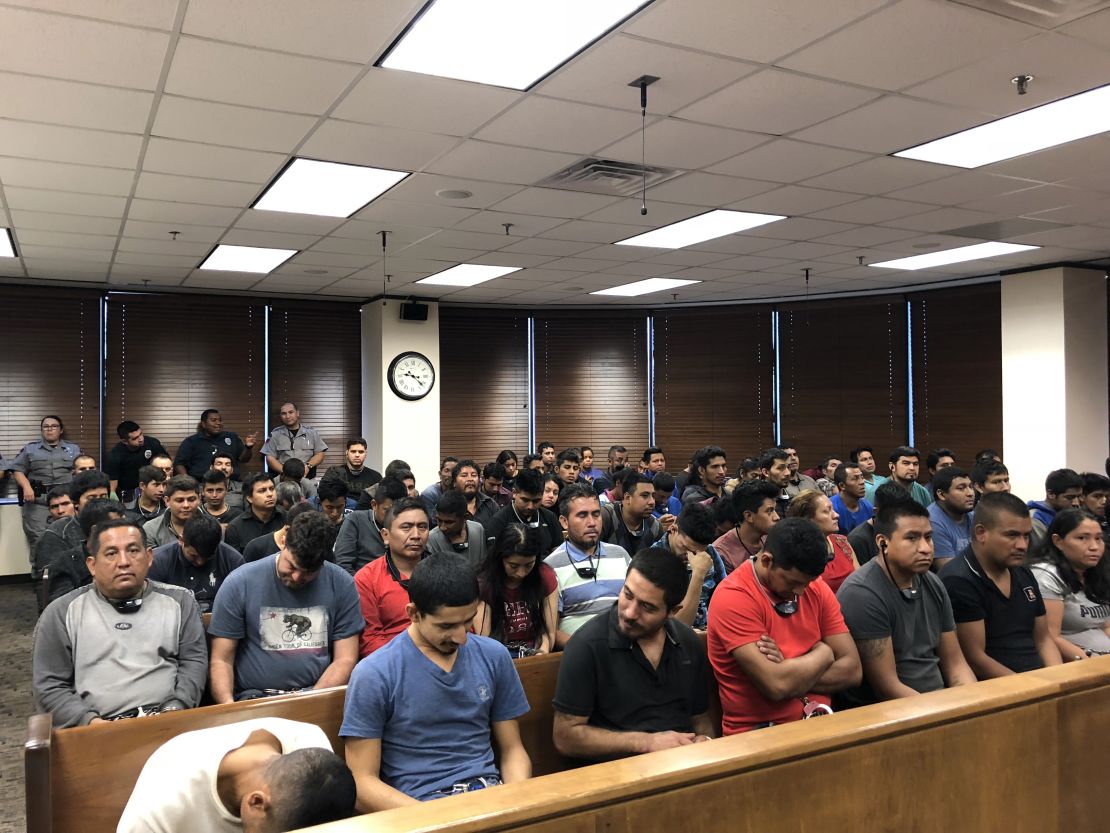The scene Monday in a federal courthouse in McAllen, Texas, where defendants are facing a federal misdemeanor charge of illegally entering the United States.