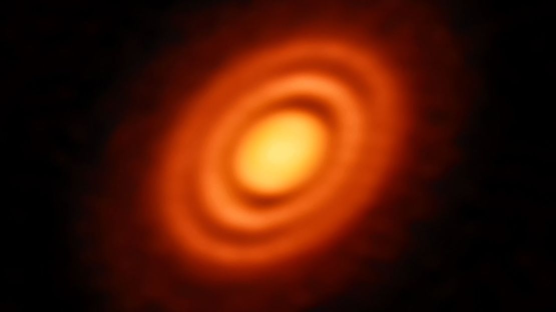 A disc of rotating dust and gas surrounding the young star HD 163296.