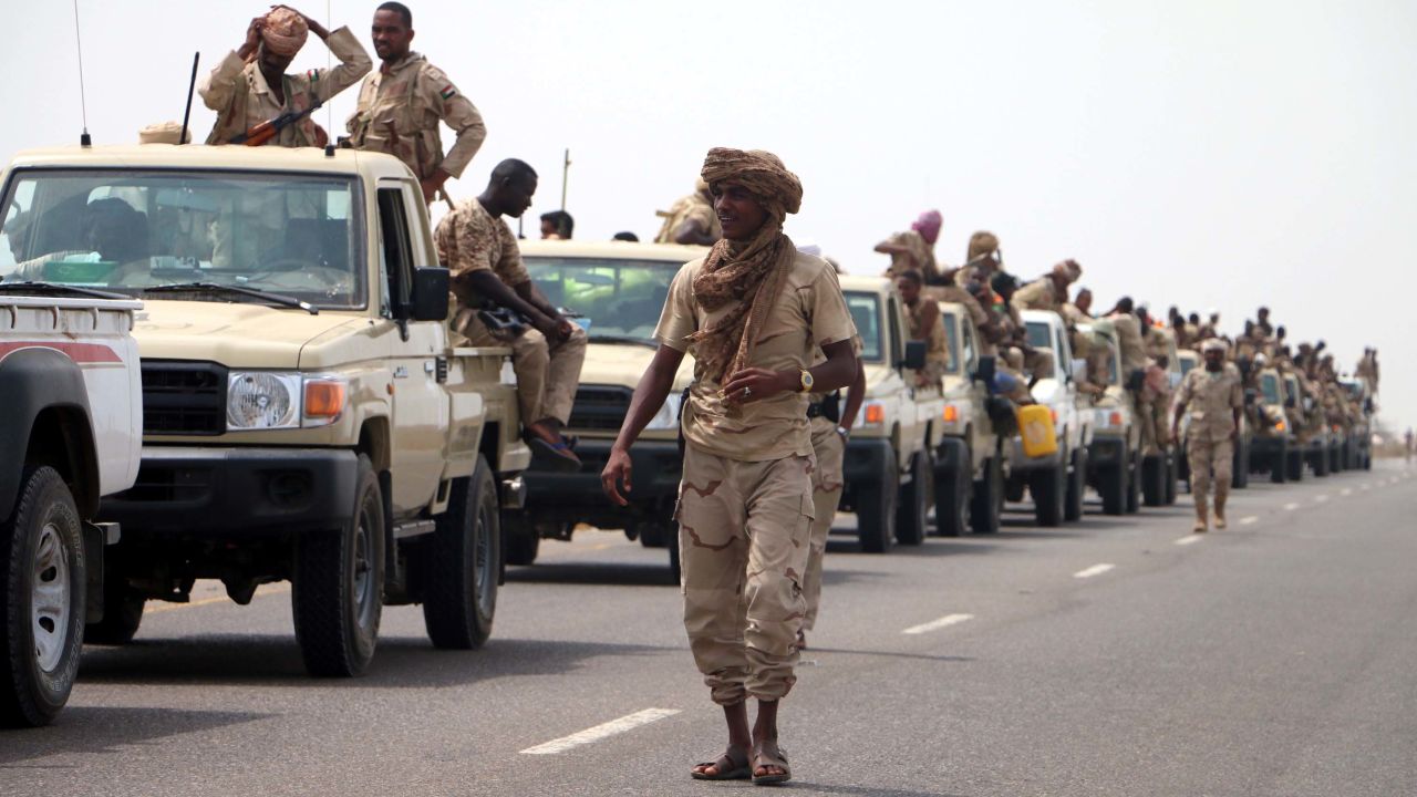 Sudanese forces fighting as part of the Saudi-led coalition in Yemen gather near the outskirts of the western port city of Hodeidah in June.